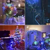 A collage of four images showing different uses of colorful LED string lights, including a bouquet, a hand holding lights, a decorated Christmas tree, and a decorated doorway. Produktbild-Vorschau