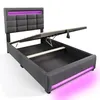 A modern upholstered bed frame with storage and LED lighting. Produktbild-Vorschau