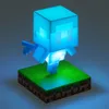A glowing blue Minecraft Allay figure stands on a grassy block base. Anteprima dell’immagine prodotto