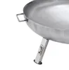 A close-up view of a metal fire pit with legs and a handle, set against a white background. Produktbild-Vorschau