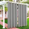 Outdoor curtains hanging on a pergola, with a house and garden in the background. Produktbild-Vorschau