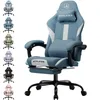A product shot of a blue gaming chair with a footrest, shown from a slightly angled front view. Several other color variations of the same chair are displayed in a vertical list to the left of the main product image. Produktbild-Vorschau