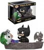 A Funko Pop! Movie Moment collectible featuring Batman and the Joker in a fight scene, shown both in its packaging and displayed outside of it. Podgląd zdjęcia produktu