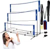 A woman is pointing at a multi-sport net system with three adjustable nets. Produktbild-Vorschau