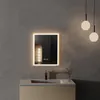 A modern bathroom vanity with a lit mirror above it. Náhled obrázku produktu