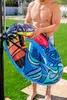 A man is rinsing an inflatable pool float under an outdoor shower. Produktbild-Vorschau
