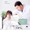 Two scientists in a lab setting examining a document and a liquid sample. Produktbild-Vorschau