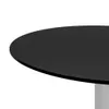 A close-up view of the edge of a round black table with a silver base. Náhled obrázku produktu