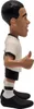A figurine of a soccer player in a white and black uniform, giving a thumbs up. Anteprima dell’immagine prodotto