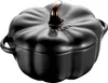 A black Staub cocotte shaped like a pumpkin with a gold handle, set against a white background. Produktbild-Vorschau