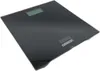 A black digital bathroom scale is shown from a slightly elevated angle against a white background. Podgląd zdjęcia produktu