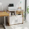 A modern home office setup with a desk and a storage cabinet. Podgląd zdjęcia produktu