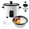 A white rice cooker with a glass lid, shown with cooked rice and vegetables in the inner pot, and a measuring cup and spatula. Produktbild-Vorschau