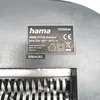 A close-up view of a label on a black shredder machine. Produktbild-Vorschau