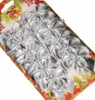 A package of shiny silver bows for Christmas tree decoration. Náhľad obrázku produktu
