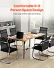 A conference room with a table and chairs, set up for a meeting. Voir les images du produit