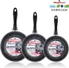 Three frying pans of different sizes are displayed side-by-side against a white background. Each pan has a black handle and a speckled gray cooking surface. A circular label with product information and branding is attached to the inside of each pan. Náhľad obrázku produktu