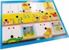 A colorful illustration of a kitchen scene with various objects and interactive elements, likely from a children's educational game. Náhled obrázku produktu