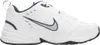 A side view of a white Nike Air Monarch IV sneaker. Produktbild-Vorschau