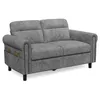 A studio shot of a gray sofa against a white background. Produktbild-Vorschau