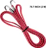 A red bungee cord with metal hooks is coiled and displayed against a white background. Voir les images du produit