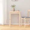 A wooden dining table and chair in a room with a white curtain and wooden floor. Náhled obrázku produktu
