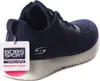 A close-up side view of a navy blue Skechers Bobs Squad training shoe with a white sole and a hang tag attached. Anteprima dell’immagine prodotto