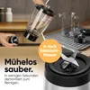A hand is shown disassembling a blender jar, with other blender parts and a pitcher on a drying rack in the background. Text overlays highlight features. Produktbild-Vorschau