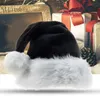 A black and white Santa hat is displayed in front of Christmas gifts and decorations. Produktbild-Vorschau