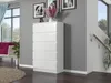 A white dresser is placed in a room with gray walls, a window, and a staircase. Náhled obrázku produktu