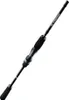 A black fishing rod with a gray and green accent, shown against a white background. Produktbild-Vorschau