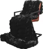 A black faux fur blanket draped over a chair. Podgląd zdjęcia produktu
