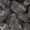 A close-up view of dark gray basalt rocks. Produktbild-Vorschau