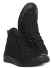 A pair of black high-top Converse sneakers. Produktbild-Vorschau