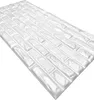 A white brick-patterned wall panel is shown from a diagonal angle against a white background. Produktbild-Vorschau