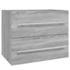 A close-up view of a gray wooden cabinet with two drawers. Anteprima dell’immagine prodotto