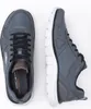 A pair of gray Skechers athletic shoes are shown from a top-down perspective against a white background. Produktbild-Vorschau
