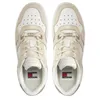 A top-down view of a pair of beige and white Tommy Hilfiger sneakers. Náhled obrázku produktu