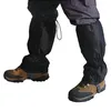 A person wearing black gaiters over their pants and hiking boots. Náhľad obrázku produktu