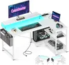 A white L-shaped gaming desk with LED lighting, a computer, monitors, and accessories. Produktbild-Vorschau