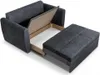 A dark gray sofa with its storage compartment open and a pull-out ottoman. Produktbild-Vorschau