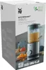 The image shows the packaging of a WMF KITCHENminis stand mixer. The packaging has a product image on the front, along with text and logos. The background is a kitchen-like setting. Voir les images du produit
