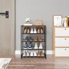 A shoe rack with various shoes displayed on different shelves, placed in an entryway or hallway next to a door and a cabinet. Produktbild-Vorschau
