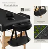 Close-up of a black massage table with a headrest and armrests, showing material details and features. Náhled obrázku produktu