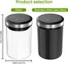 Two vacuum-sealed containers, one glass and one black stainless steel, are shown side-by-side with dimensions indicated. Náhled obrázku produktu
