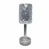 A clear, professional studio shot of a crystal-like table lamp on a white background. Produktbild-Vorschau