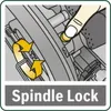 A close-up illustration showing a finger pressing a spindle lock button on a tool, with arrows indicating rotation. Podgląd zdjęcia produktu