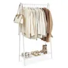 A white metal garment rack displaying clothing and shoes on two shelves. Produktbild-Vorschau