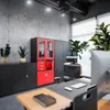An office space with furniture and plants. Voir les images du produit