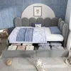 A child's bedroom with a bed that has storage drawers. Anteprima dell’immagine prodotto